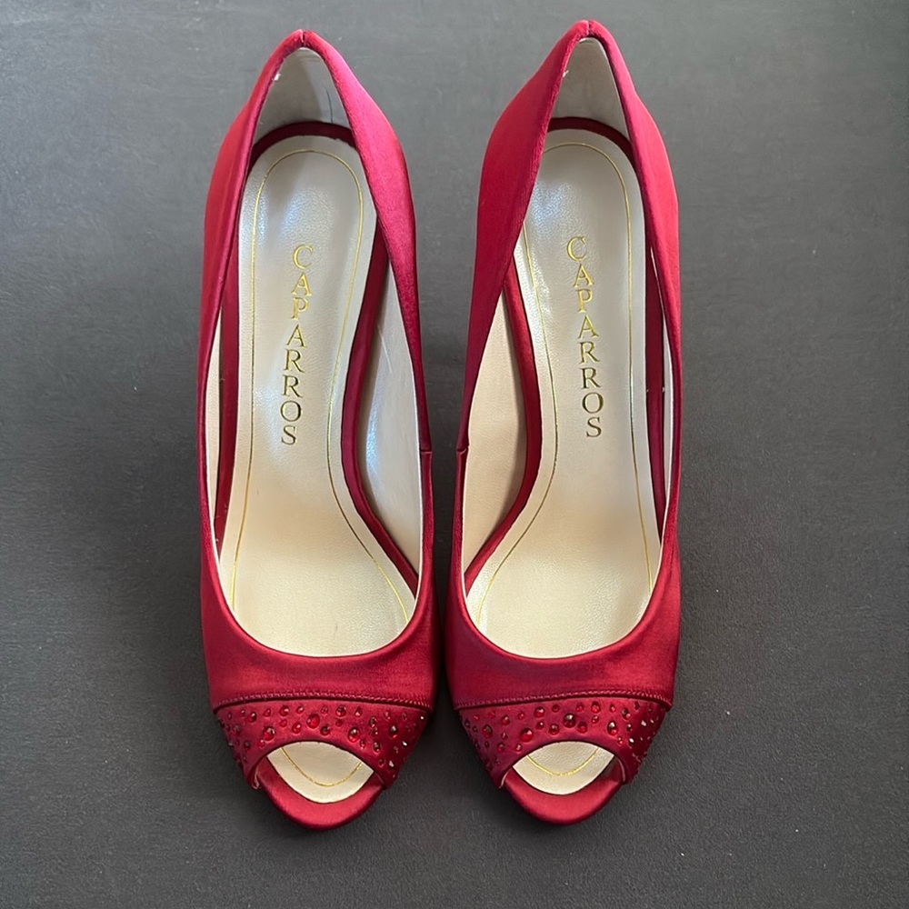 CAPARROS Odell Ruby Red Satin Suede Peep-Toe Heels with Crystal Embellishment